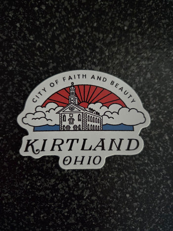 Stickers magnets and patches collection featuring small Kirtland souvenirs.